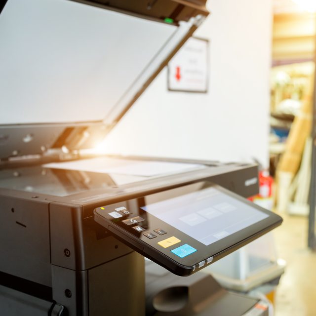 bussiness-man-hand-press-button-panel-printer-640x640